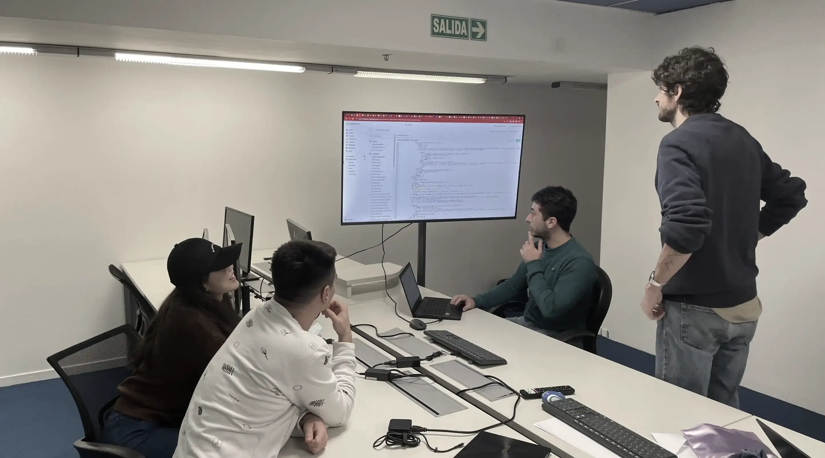 Plank engineers reviewing code together